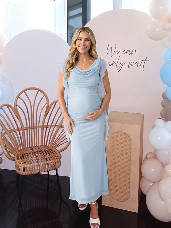 sky blue mesh maternity gown with draped cowl neckline and cascading ruffle sleeves