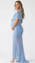 dusty blue ruched maternity gown with mesh overlay short sleeves and sweep train