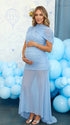 dusty blue ruched maternity gown with mesh overlay short sleeves and sweep train