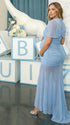 dusty blue ruched maternity gown with mesh overlay short sleeves and sweep train