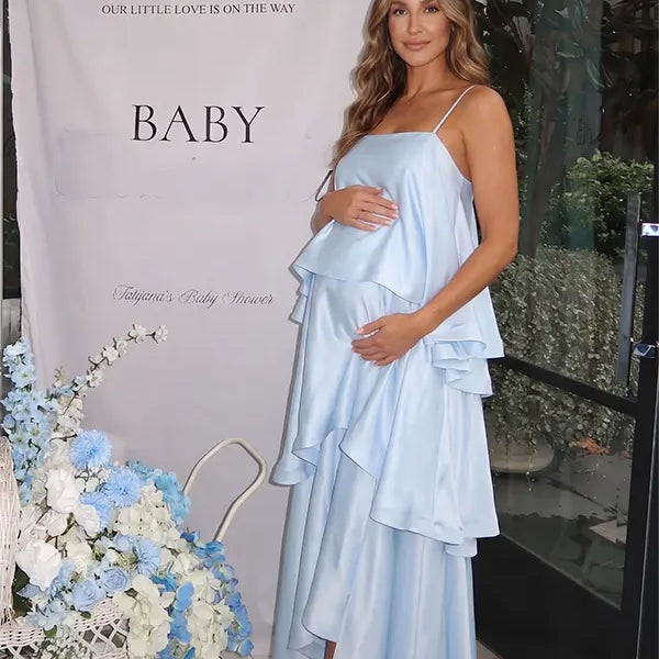 sky blue tiered ruffle maternity maxi dress with spaghetti straps and flowy layers