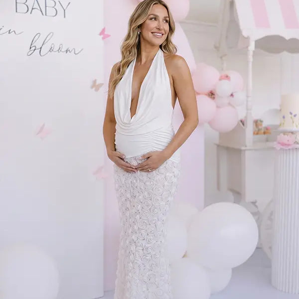White Open Back Maternity Maxi Dress with Halter Neck, Ruched Waist and 3D Floral Skirt | Bumplook
