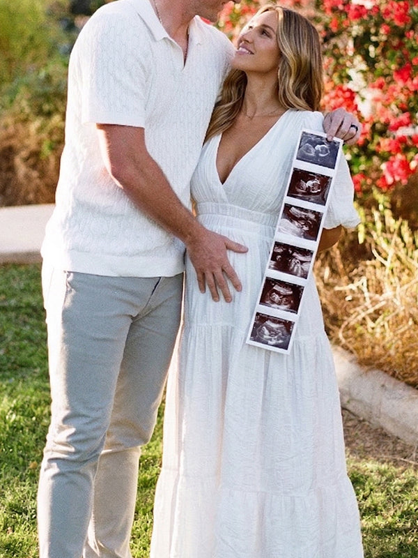 White v neck maternity maxi dress for baby shower, gender reveal and maternity photoshoot.