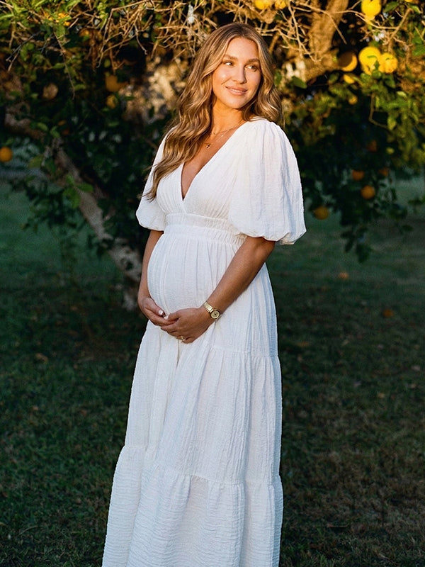 White v neck maternity maxi dress for baby shower and maternity photoshoot.