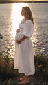 White Beach Maternity Photoshoot Dress with Off Shoulder Puff Sleeves | Bumplook
