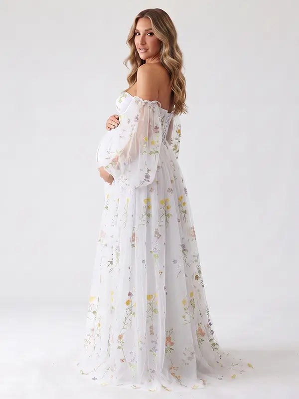 White Floral Maternity Photoshoot Dress with Sweetheart Neckline and Sheer Off Shoulder Sleeves for Baby Shower, Pregnancy Announcement and Garden Maternity Photos | Bumplook
