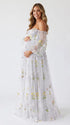 White Floral Maternity Photoshoot Dress with Sweetheart Neckline and Sheer Off Shoulder Sleeves for Baby Shower, Pregnancy Announcement and Garden Maternity Photos | Bumplook