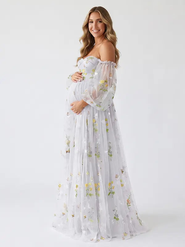 White Floral Maternity Photoshoot Dress with Sweetheart Neckline and Sheer Off Shoulder Sleeves for Baby Shower, Pregnancy Announcement and Garden Maternity Photos | Bumplook