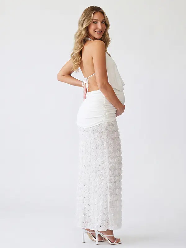 White Open Back Maternity Maxi Dress with Halter Neck, Ruched Waist and 3D Floral Skirt | Bumplook