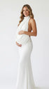 white halter maternity gown with open back design and pearl waist detail