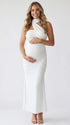white halter maternity maxi dress with ruched bodycon silhouette and cross neck detail