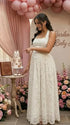Elegant maternity photoshoot dress in white lace halter style