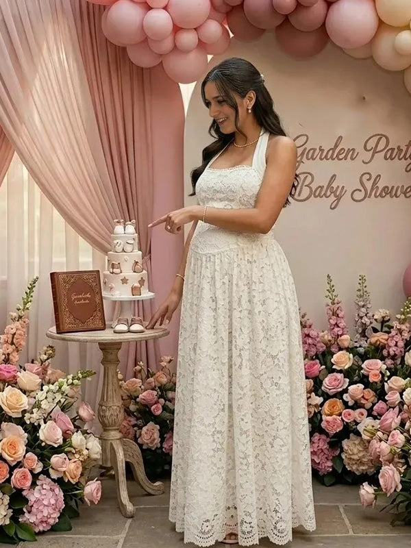 Elegant maternity photoshoot dress in white lace halter style