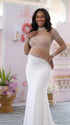A white long sleeve rhinestone illusion mesh maternity mermaid maxi dress for luxury maternity photoshoots, baby showers, pregnancy announcements, and elegant formal events.