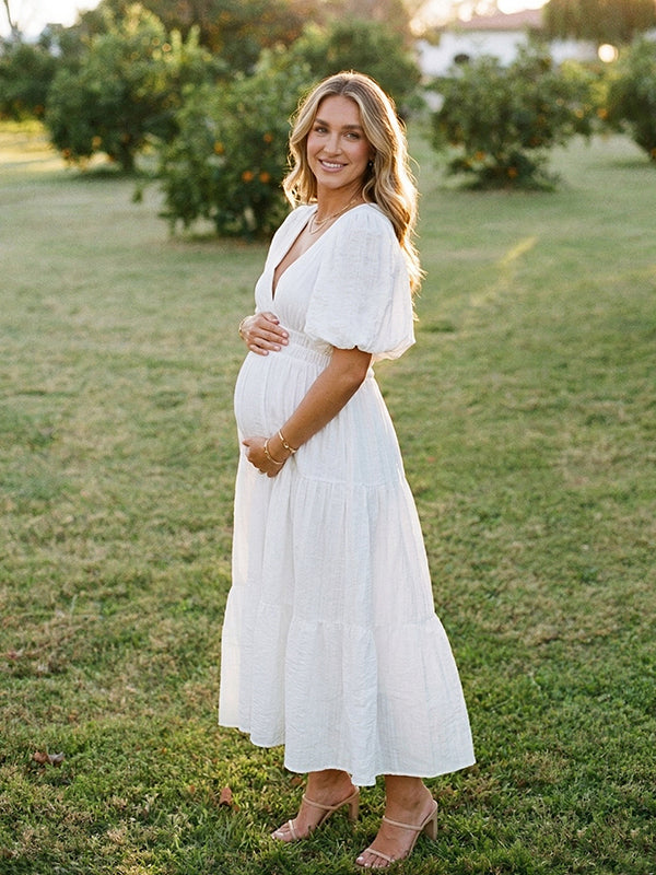 White v neck maternity maxi dress for baby shower, gender reveal and maternity photoshoot.