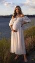 White Maternity Photoshoot Dress for Romantic Outdoor Pregnancy Portraits | Bumplook