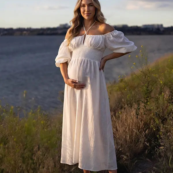 White Maternity Photoshoot Dress for Romantic Outdoor Pregnancy Portraits | Bumplook