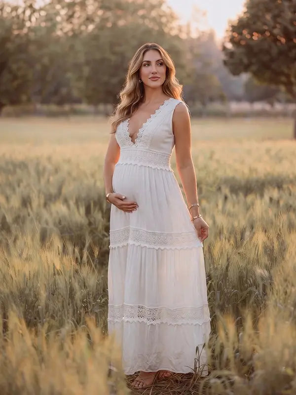 White Boho Lace Maternity Maxi Dress with Deep V-Neck, High Waist and Flowing Tiered Skirt | Bumplook