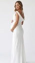 white off shoulder cowl neck maternity gown with open back detail and flowing silhouette