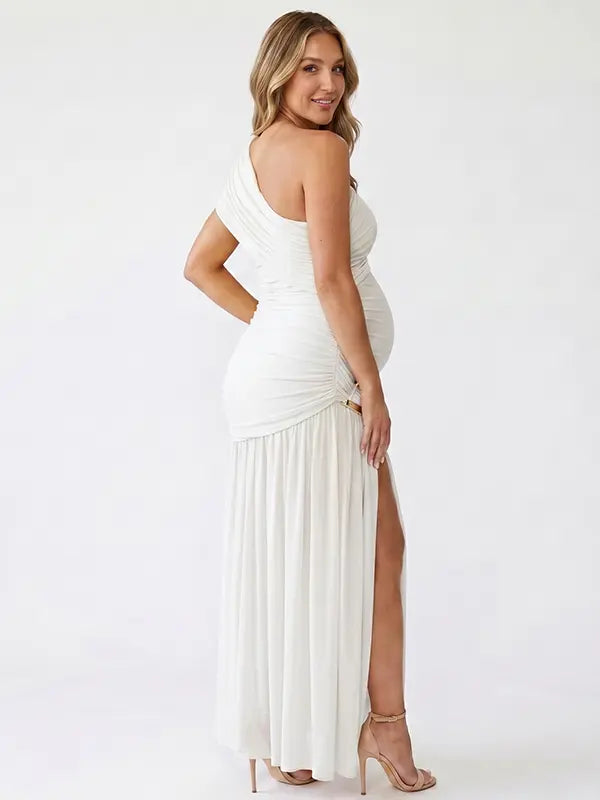 White one shoulder goddess maternity gown with ruched bodice and flowing mesh skirt