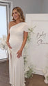 White one shoulder goddess maternity gown with ruched bodice and flowing mesh skirt