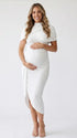 white ruched maternity midi dress with matching shawl and bodycon silhouette