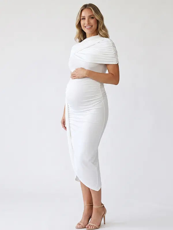 white ruched maternity midi dress with matching shawl and bodycon silhouette