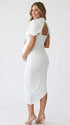 white ruched maternity midi dress with matching shawl and bodycon silhouette