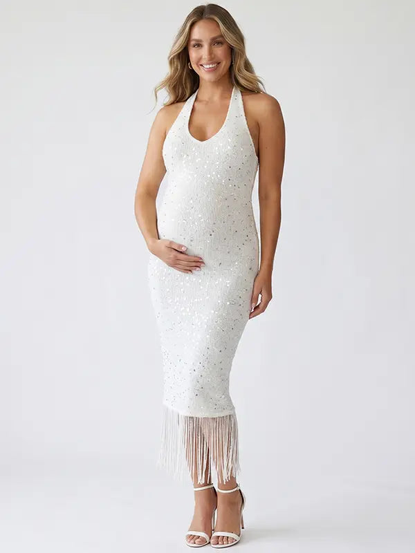 white sequin fringe maternity midi dress with halter neckline and open back