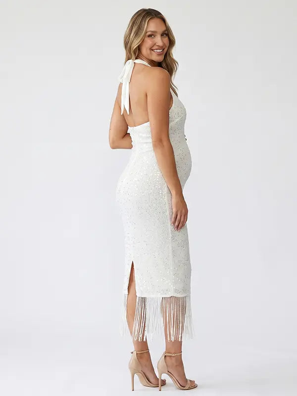 white sequin fringe maternity midi dress with halter neckline and open back