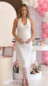 white sequin fringe maternity midi dress with halter neckline and open back