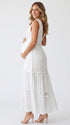 White Maternity Photoshoot Dress with Deep V-Neck and Boho Lace Details for Outdoor Pregnancy Portraits | Bumplook