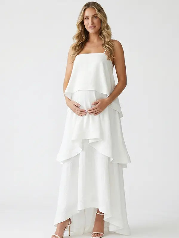 white tiered ruffle maternity maxi dress with spaghetti straps and layered ruffles