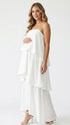 white tiered ruffle maternity maxi dress with spaghetti straps and layered ruffles