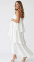 white tiered ruffle maternity maxi dress with spaghetti straps and layered ruffles