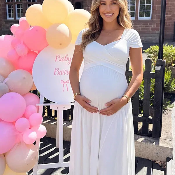 white wrap v neck short sleeve maternity maxi dress for baby shower and maternity photoshoot