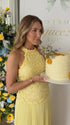 Yellow Pleated Maternity Maxi Dress with Halter Neck | Bumplook
