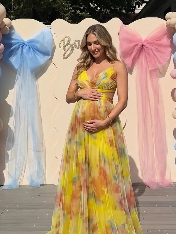 yellow floral mesh maternity maxi dress with lace up back and flowy skirt