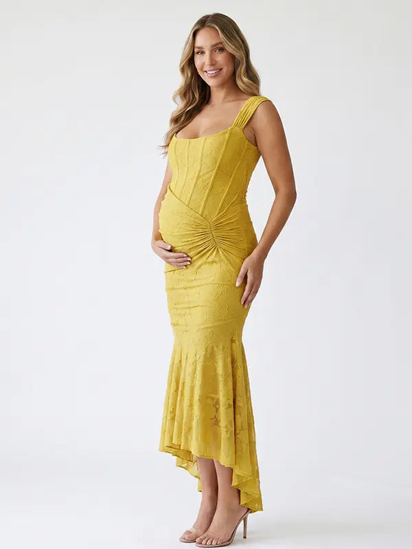 yellow jacquard maternity midi dress with corset bodice and high low hem