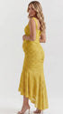 yellow jacquard maternity midi dress with corset bodice and high low hem