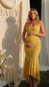 yellow jacquard maternity midi dress with corset bodice and high low hem