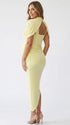 yellow ruched maternity midi dress with matching shawl and bodycon silhouette
